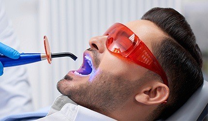 Man receiving dental bonding