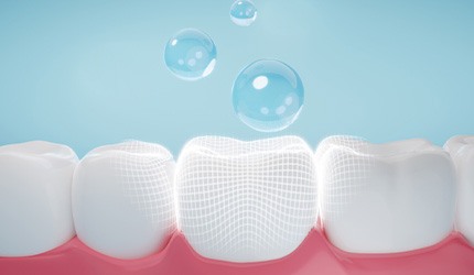 A CGI rendering of fluoride coating the teeth