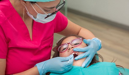 A child getting fluoride treatment