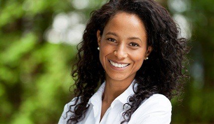 Woman smiling outdoors