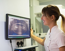 implant dentist in DeSoto taking X-rays of a patient 
