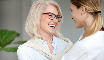 A patient smiling after her smile makeover in DeSoto, TX