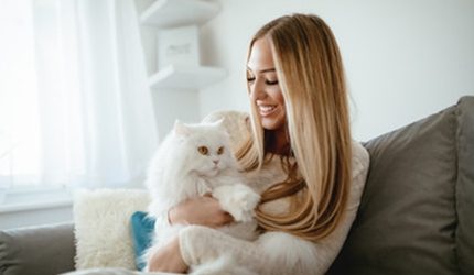 Dr. Najjar holding her cat