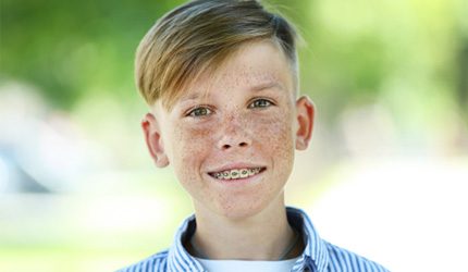 young boy with braces   