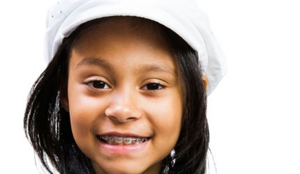 young girl with braces