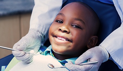 Smiling child in dental chair