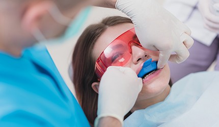 Patient receiving fluoride treatment