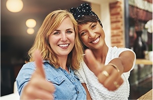 Two women smiling together