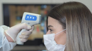 DeSoto dentist give no-touch temperature check to patient in COVID-19