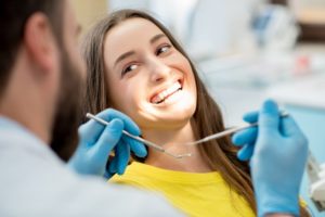 Smiling woman visits her DeSoto dentist for checkup