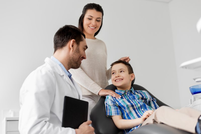 A mother and son visiting a family dentist.