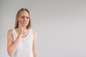 woman toothache closeup 