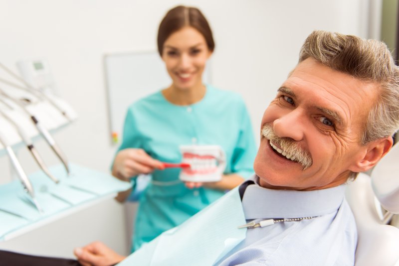 patient undergoing dental checkups with dentures in DeSoto