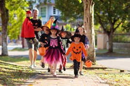 a group of trick-or-treaters