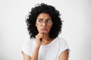 Woman wondering why she needs a root canal despite no dental pain
