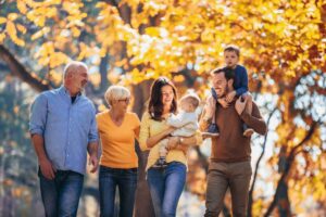 Three generations of a family out on a walk