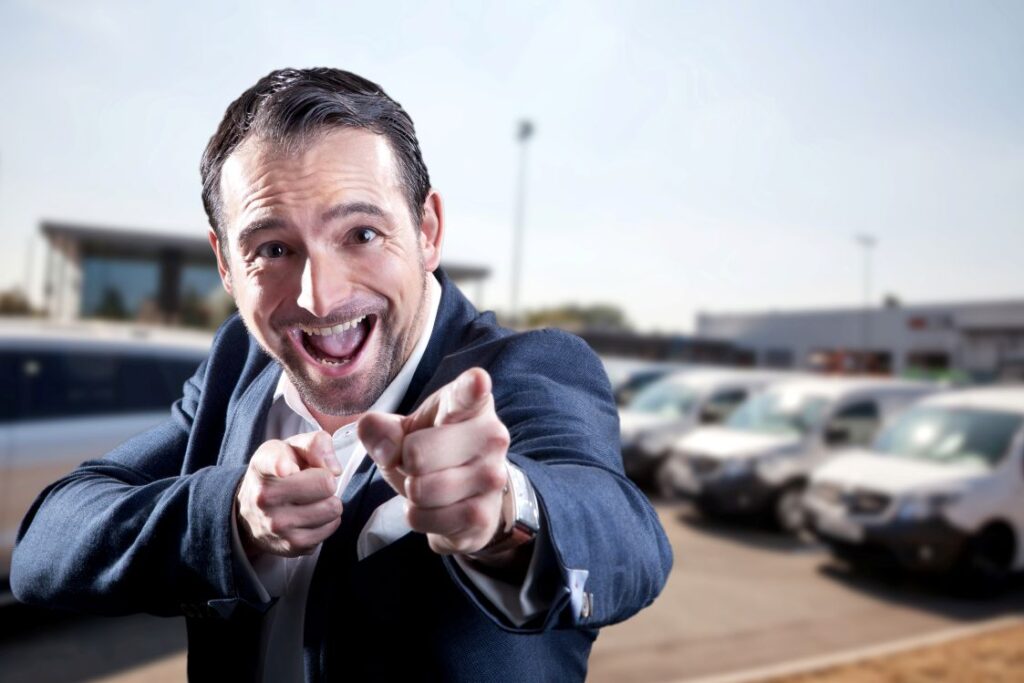 A sleazy used car salesman