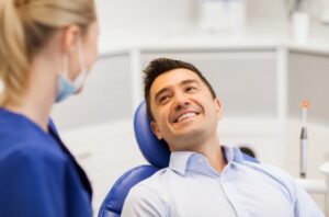 Man smiling at the dentist
